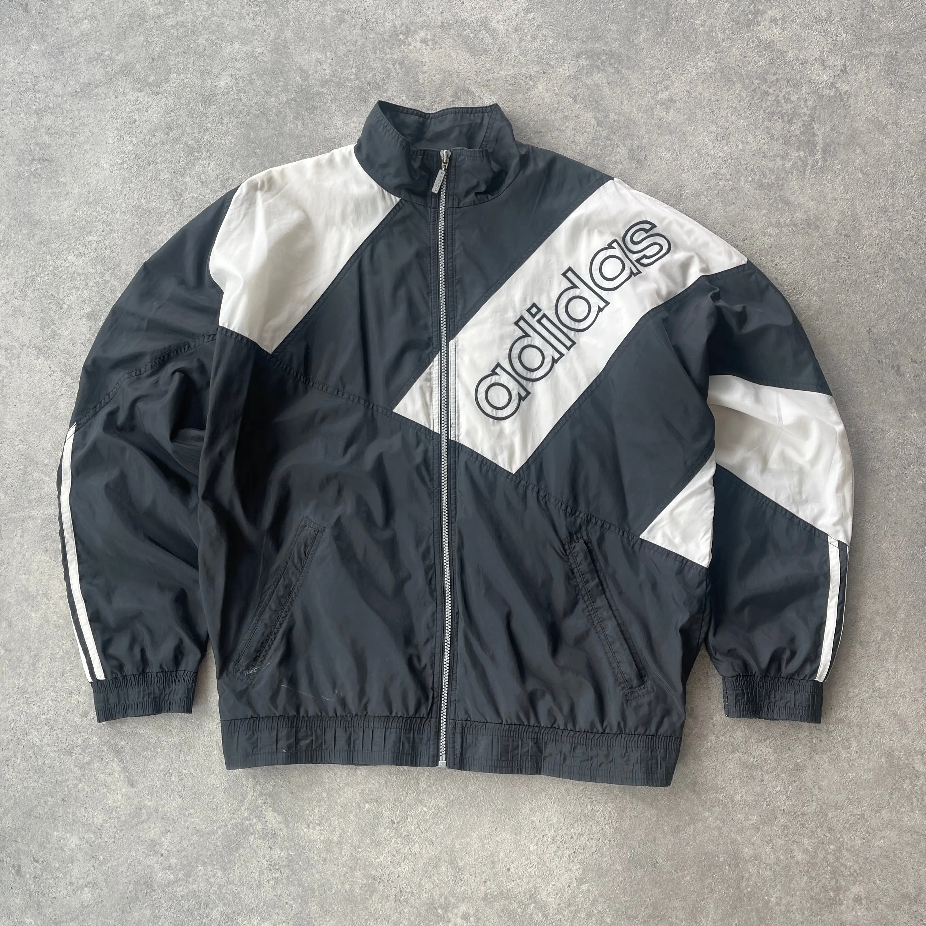 Adidas 1990s lightweight embroidered spellout shell jacket (S)