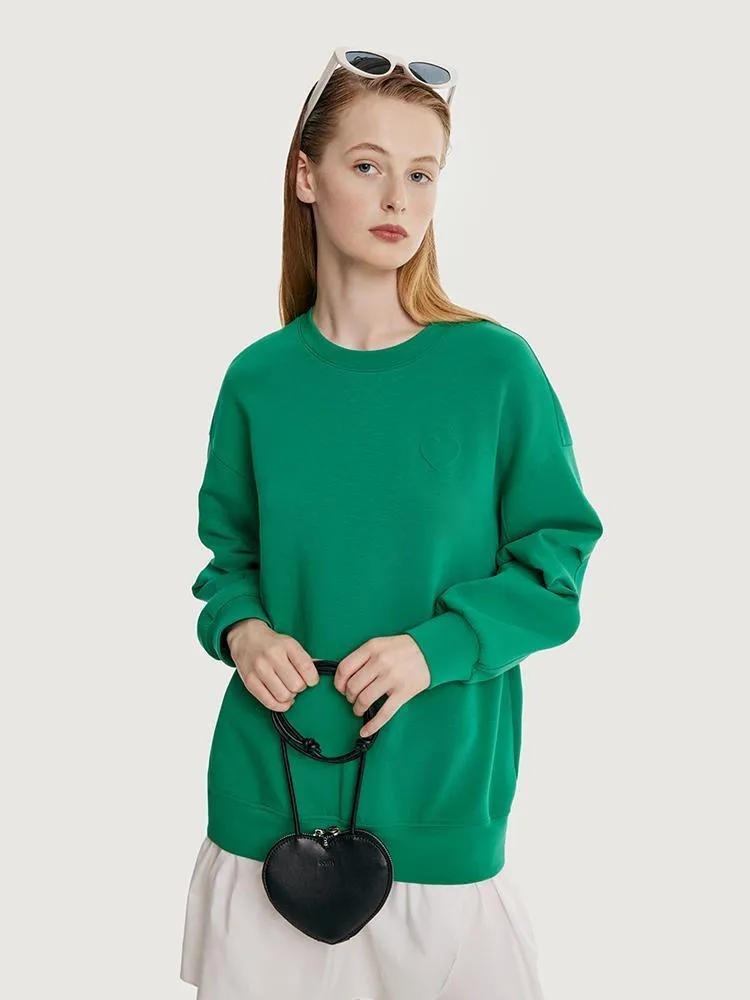 Faux Two-piece Hoodie Dress Paired With A Handbag